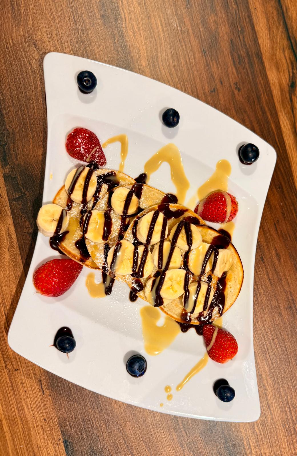 Pancakes z Nutellą i sosem pistacjowym